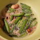 Close-up of French's Green Bean Casserole Snack Mix rehydrating in a bowl of water